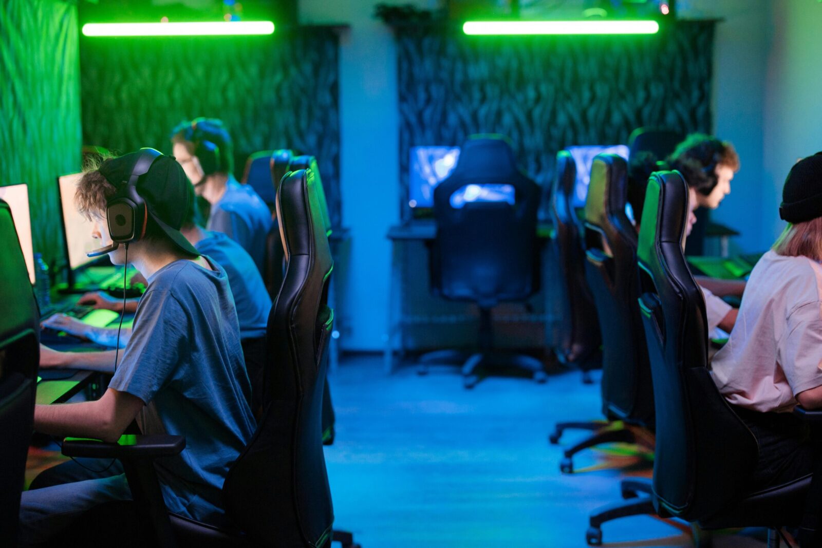 A vibrant gaming scene with a focused esports team immersed in intense gameplay.